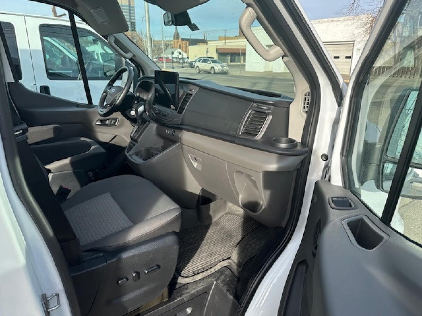 2022 White /Gray Ford Transit 350 Wagon Med. Roof XLT w/Sliding Pass. 148-in. WB (1FBAX9C85NK) with an 3.5L V6 DOHC 24V engine, 6A transmission, located at 3200 1st Avenue North, Billings, MT, 59101, (406) 245-9055, 45.779270, -108.510742 - This is One of Our Super Vehicles Available for Rent. 12 Passenger Seating, Power Heated Seats, Tilt Steering, Cruise Control, Air Conditioning, Towing, All Wheel Drive, Larger Fuel Tank, and Many More Custom Options! CarFax Dealer Auto Brokers of Montana/AA&A Auto Rental/Fox Car Rental Billings - Photo#4